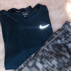 Lot of Nike Dri Fit Running T and printed shorts.